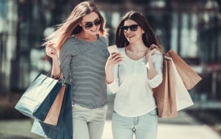 An image of two women enjoying shopping in Broken Bow.