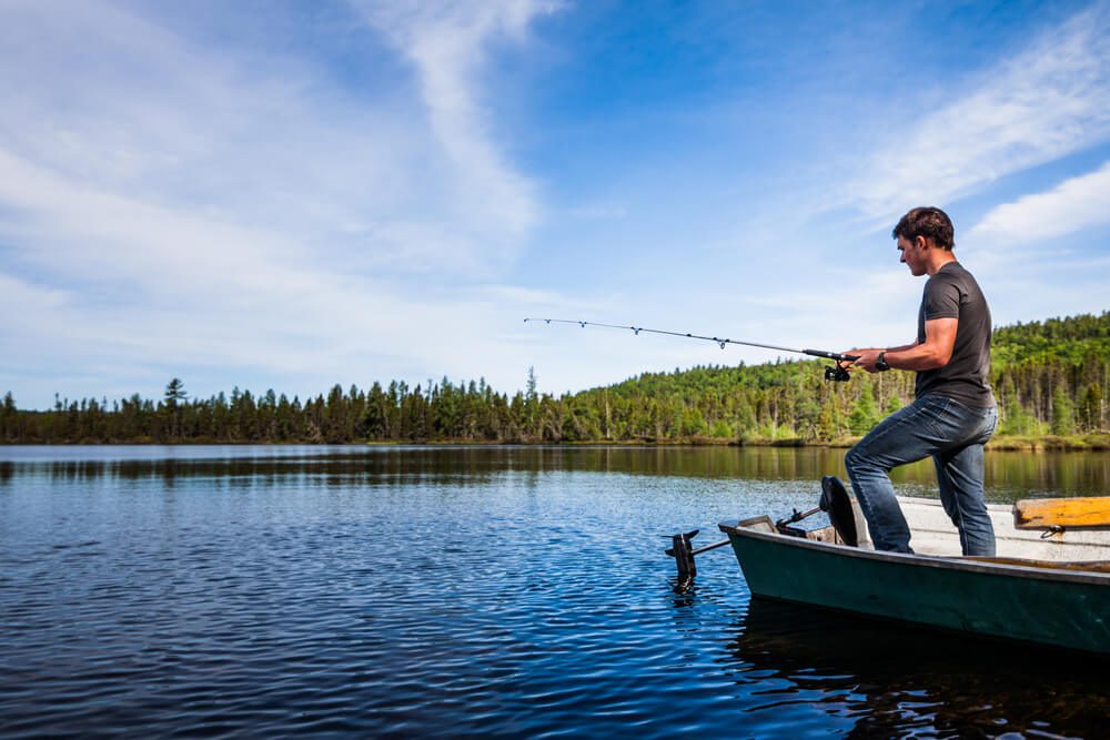 A man fishing on Broken Bow Lake.