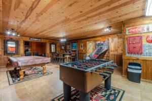 A photo of a game room in a Broken Bow vacation rental to play in after racing go-karts.