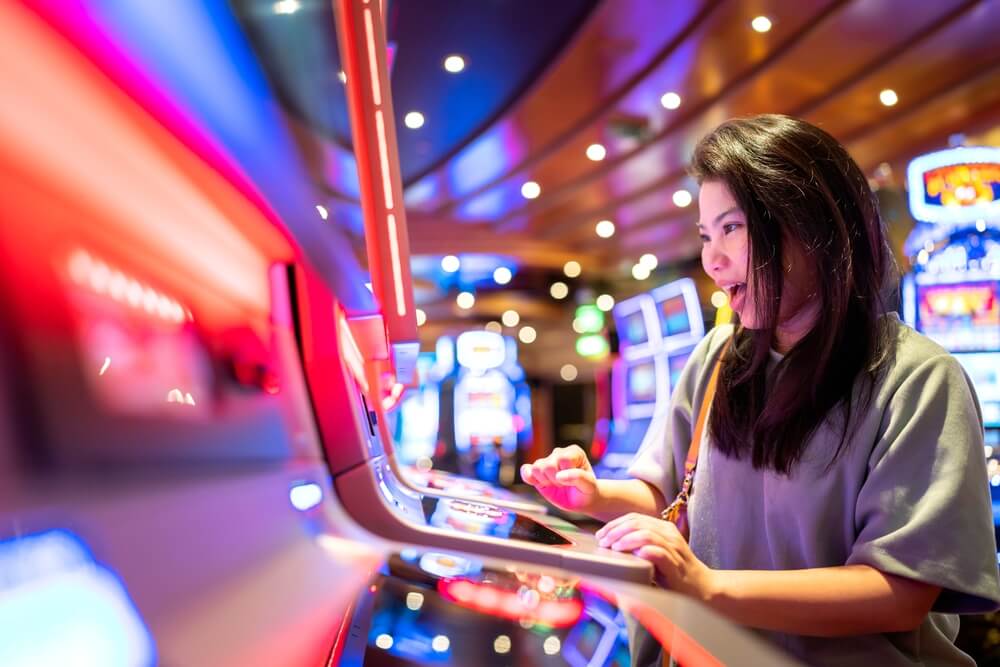 A woman at a slot machine at the Choctaw Casino in Hochatown.