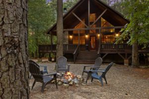 The firepit area of a cabin in Hochatown to relax in after exploring things to do.