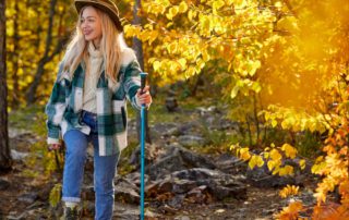 A woman hiking, one of the best things to do in Hochatown in the fall.